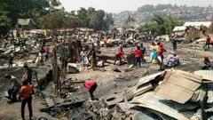 A massive fire sparked in a house where a woman fried donuts near cans of petrol, razed more than 150 homes in the eastern DR Congo, killing a seven-year-old girl.
