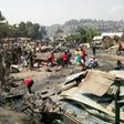 A massive fire sparked in a house where a woman fried donuts near cans of petrol, razed more than 150 homes in the eastern DR Congo, killing a seven-year-old girl.