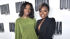 Sharon Chuter and singer Estelle at the LA launch of UOMA Beauty [Credit: Hollywood Reporter]