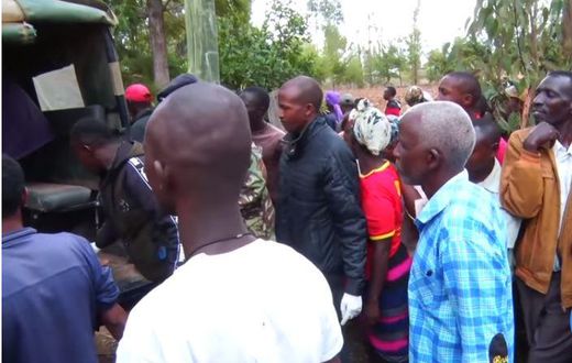 File image of police officers ferrying the body of a woman who was killed by her lover