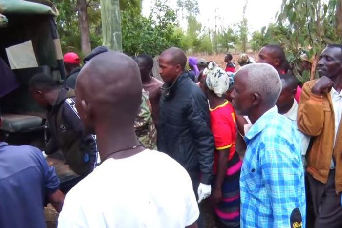 File image of police officers ferrying the body of a woman who was killed by her lover