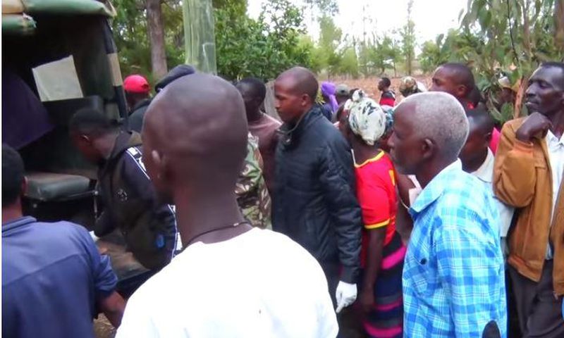 File image of police officers ferrying the body of a woman who was killed by her lover