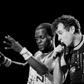 Johnny Clegg (R) performed in the band Savuka for years under apartheid until group member Dudu Zulu (L) was shot dead in 1992 and dancer Dudu Zulu of South African band Savuka perform on stage at the Amnesty International Concert on October 10, 1988 i...