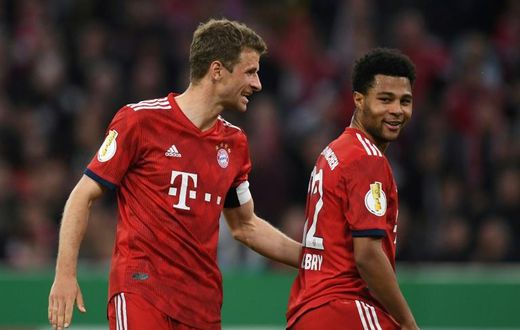 Thomas Mueller (L) deserves more respect than to be left on the bench by Bayern Munich, club team-mate Serge Gnabry (R) said Friday.