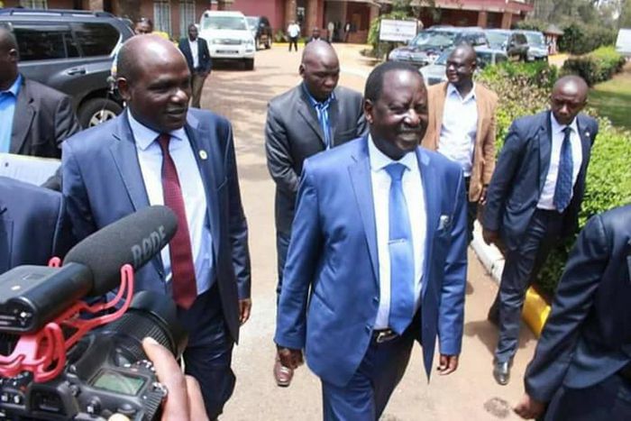 ODM leader Raila Odinga with IEBC Chairman Wafula Chebukati