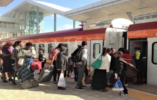 File image of passengers boarding a train