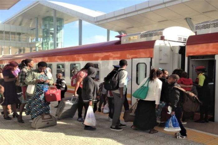 File image of passengers boarding a train
