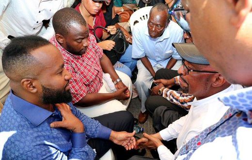 Governor Hassan Joho with the family of Likoni tragedy victims