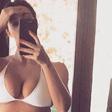 Kim K Shows Off Toned Abs In Bikini Pic