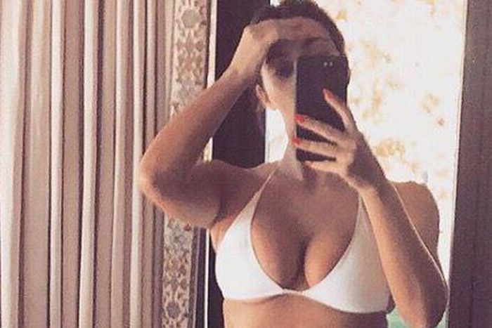 Kim K Shows Off Toned Abs In Bikini Pic