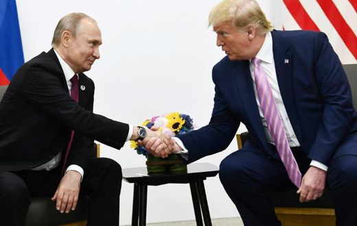 US President Donald Trump (R) attends a meeting with Russia's President Vladimir Putin during the G20 summit in Osaka on June 28, 2019