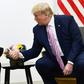 US President Donald Trump (R) attends a meeting with Russia's President Vladimir Putin during the G20 summit in Osaka on June 28, 2019