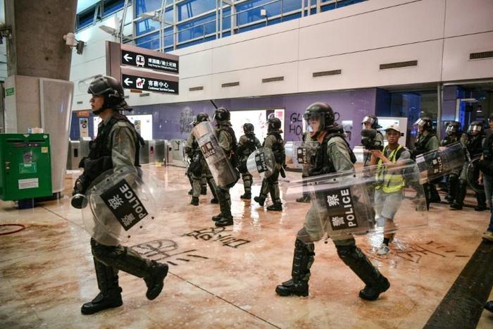 Police entered Tung Chung metro station after protesters blocked several routes leading to Hong Kong's airport