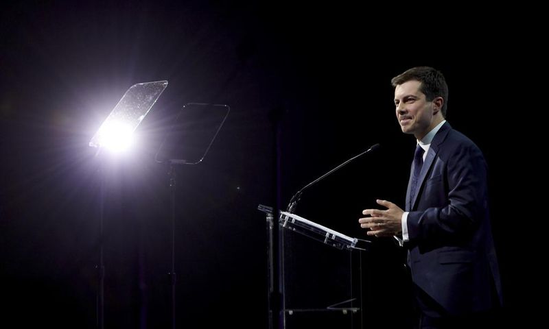 Buttigieg Confronts Race and Identity in Speech to Gay Group