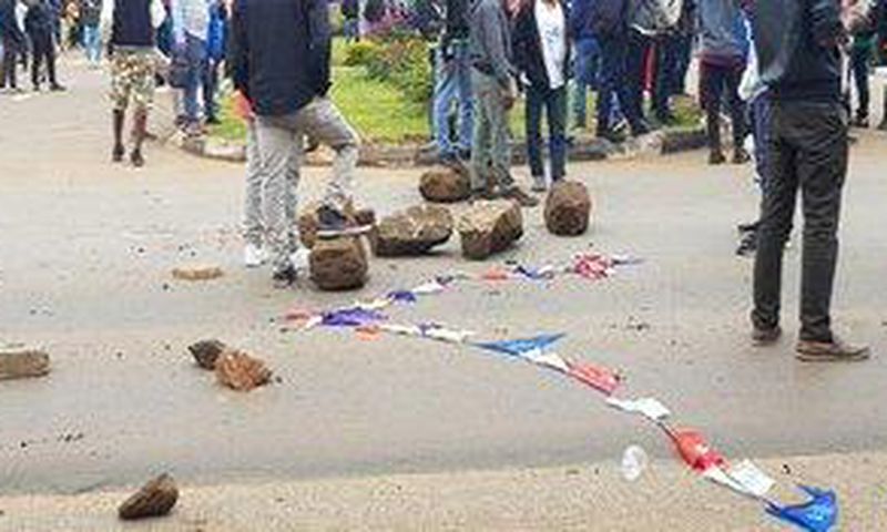 Multimedia University students engage police in running battles