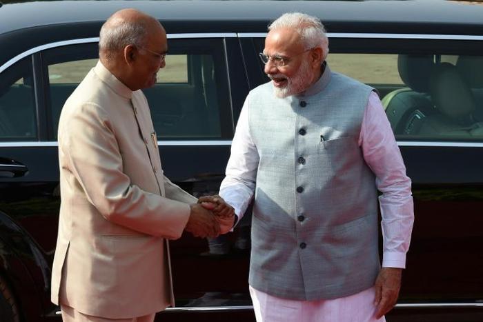 Pakistan has denied India's president the right to fly through its airspace in a new escalation of tensions; India's Prime Minister Narendra Modi (R) is pictured welcoming India's President Ram Nath Kovind in New Delhi on August 21, 2019