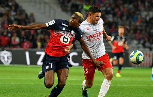 Nigeria forward Victor Osimhen claimed a late point for Lille with his seventh league goal of the season