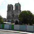 Workers installed fencing around Notre-Dame Cathedral in August as they began lead clean-up operations