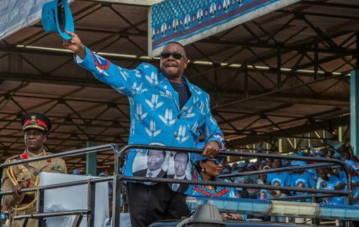 Mutharika salutes the crowd at the launch of his party manifesto in April