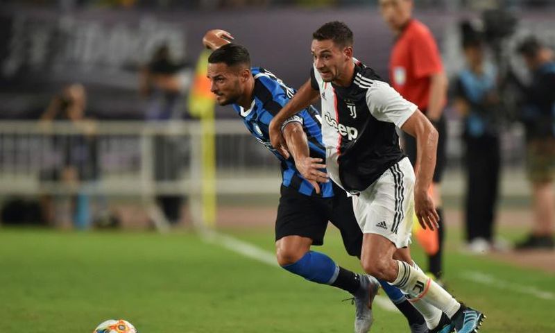 Juventus's Mattia De Sciglio (R) has been replaced by Inter Milan's Danilo D'Ambrosio (L) for Italy's Euro 2020 qualifiers