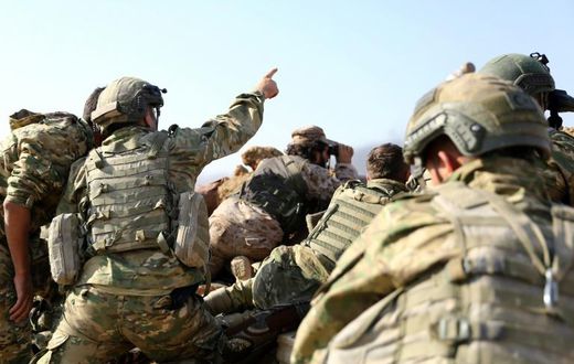 Turkish troops and their Syrian allies step up their offensive against Kurdish forces, thrusting into the key border town of Ras al-Ain