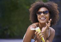 Woman applying sunscreen (transfercancun-airport)