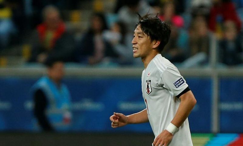 Japan's Koji Miyoshi celebrates after scoring during the 2-2 draw with Uruguay at the Copa America