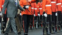 Kenyan President Daniel Arap Moi inspects guards during his farewell parade December 28, 2002.