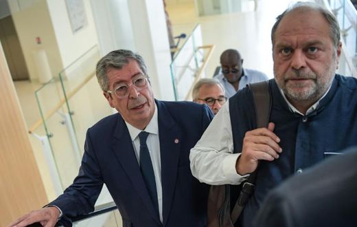 Patrick Balkany, left, arriving at the Paris courthouse on Friday with his lawyer Eric Dupond-Moretti. Balkany was sentenced to four years in prison for tax fraud.