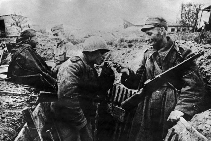 Picture taken in 1944 shows Polish and Soviet soldiers in ramparts on the front near Warsaw during World War II. Poland says it lost millions of lives and suffered much destruction and claims it is entitled to German reparations.