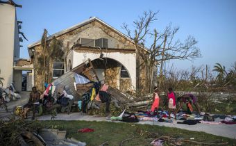 Churning North, Hurricane Drubs Weary Carolinas