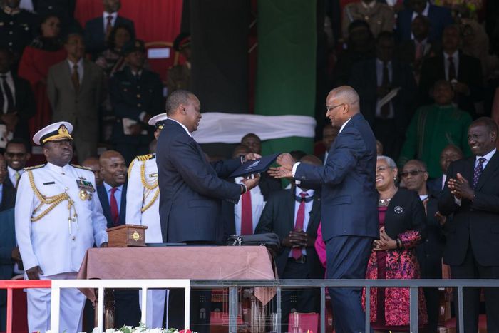 President Uhuru Kenyatta with CBK governor Patrick Njoroge