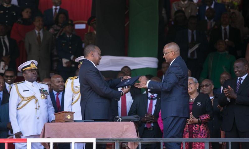 President Uhuru Kenyatta with CBK governor Patrick Njoroge
