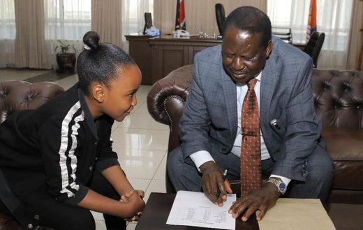 AU envoy Raila Odinga with Wendy Waeni at his office