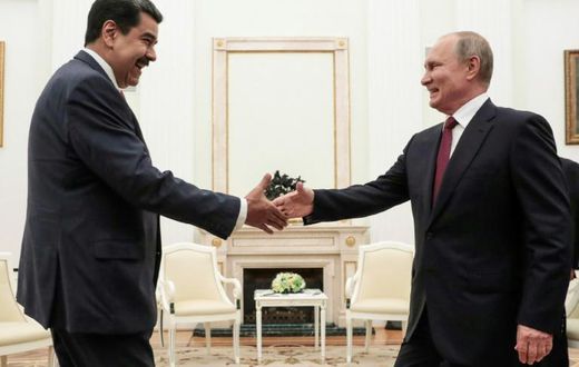 Russian President Vladimir Putin (R) welcomed embattled Venezuelan President Nicolas Maduro to the Kremlin urging dialogue with the opposition