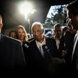 Socialist Prime Minister Antonio Costa (C) arrives at a party gathering in Lisbon as exit polls show the Socialists have taken the lead in Sunday's election