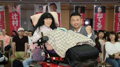 Newly elected lawmaker Eiko Kimura, who is paralysed from the neck down, has called for a system to ensure necessary care for the disabled