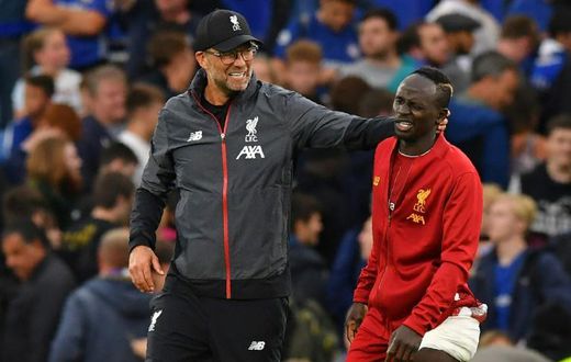Jurgen Klopp (left) will have Sadio Mane (right) available for Saturday's trip to Sheffield United