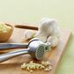 Learn How To Use A Garlic Press