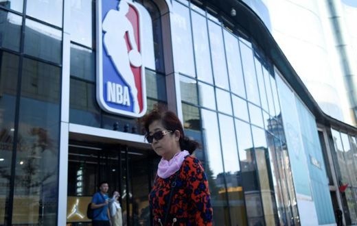 A bipartisan group of eight US lawmakers on Wednesday urged NBA commissioner Adam Silver to suspend all league activities in China until a sponsor and telecast boycott ends, which would close such places as the NBA merchandise store in Beijing