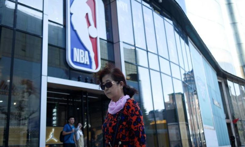 A bipartisan group of eight US lawmakers on Wednesday urged NBA commissioner Adam Silver to suspend all league activities in China until a sponsor and telecast boycott ends, which would close such places as the NBA merchandise store in Beijing