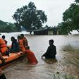 The train was stuck for several hours in Thane district before authorities called in the Indian navy and National Disaster Response Force