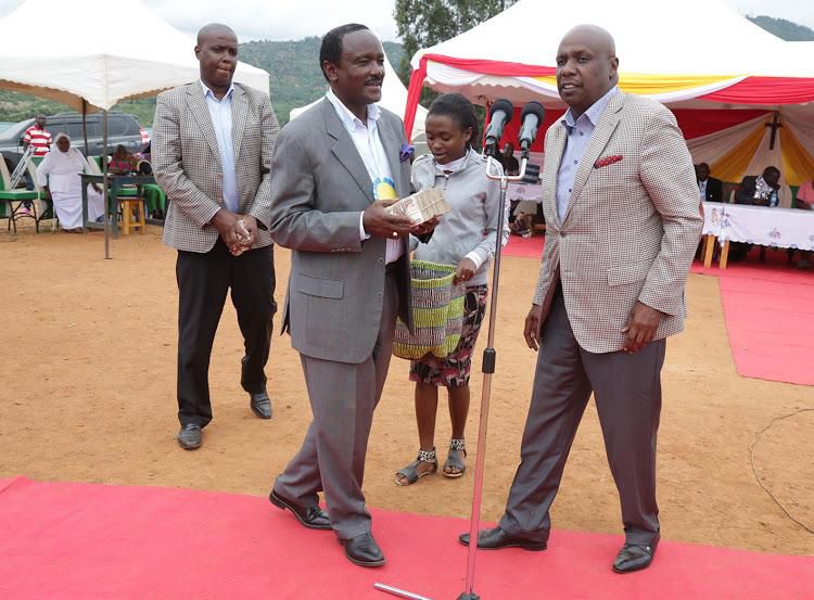 Kalonzo Musyoka with Gideon Moi at a recent fund raiser where he announced plans for a merger between Wiper and KANU