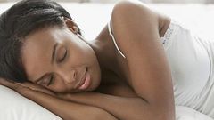 Woman sleeping(Natural Hair Mag)