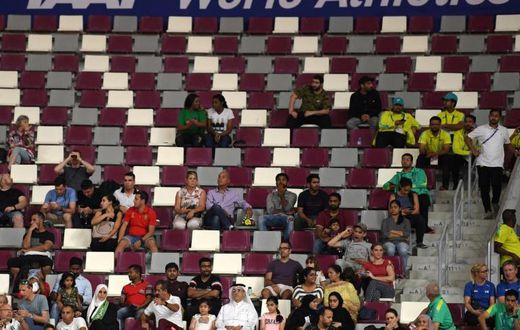 The World Athletics Championships have taken place in front of rows of empty seats in the Khalifa International Stadium in Doha