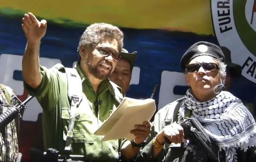 Former senior commander of the dissolved FARC rebel group Ivan Marquez (L) and fugitive rebel Jesus Santrich (R) are pictured in a video published on August 29, 2019 announcing their return to arms