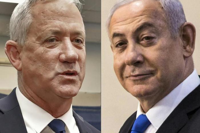 Near-complete official results from Israel's general election confirm deadlock between Prime Minister Benjamin Netanyahu and opposition leader Benny Gantz, leaving the two men to fight it out over who will head a unity government