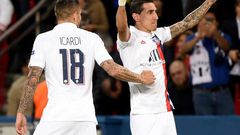 Angel Di Maria celebrates with Mauro Icardi after scoring one of his two goals as Paris Saint-Germain beat Real Madrid 3-0 in their Champions League opener