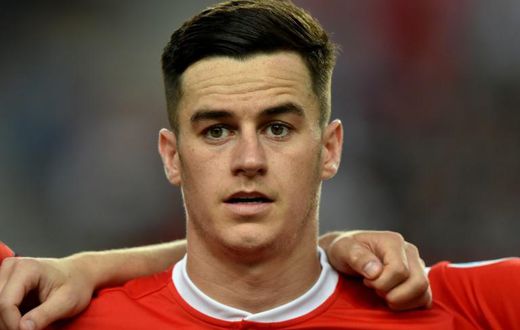 Wales and Derby midfielder Tom Lawrence has apologised for his behaviour after being charged with drink driving last month
