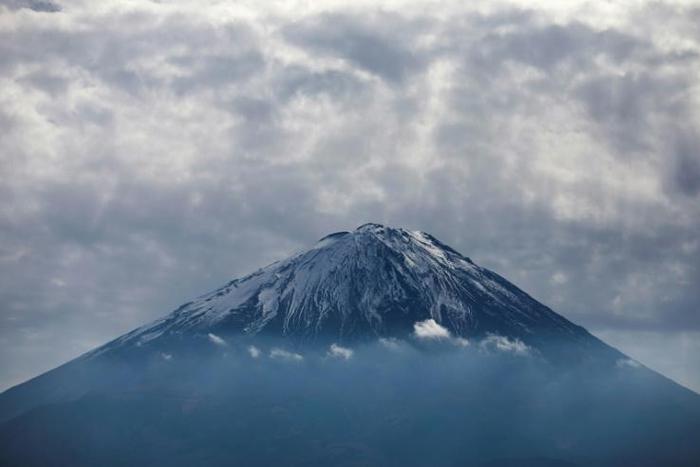 A Russian climber was killed by a falling rock near the summit of Japan's Mount Fuji, the country's highest mountain